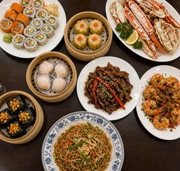 Spread of sushi, dim sum, crab legs, beef and noodles at Asian Buffet, Calgary